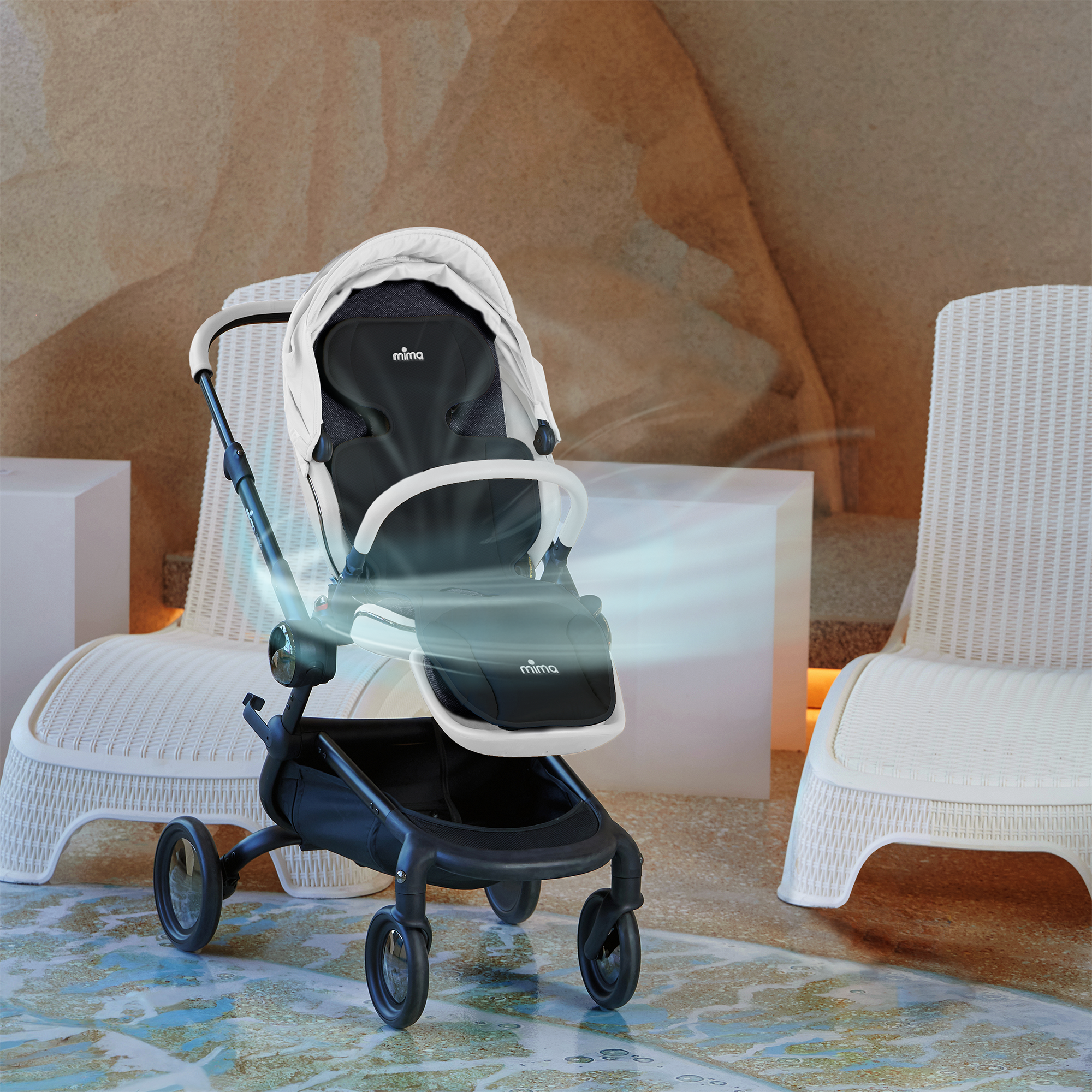 mima flo lollipop seat pad in black installed on a creo stroller indoors
