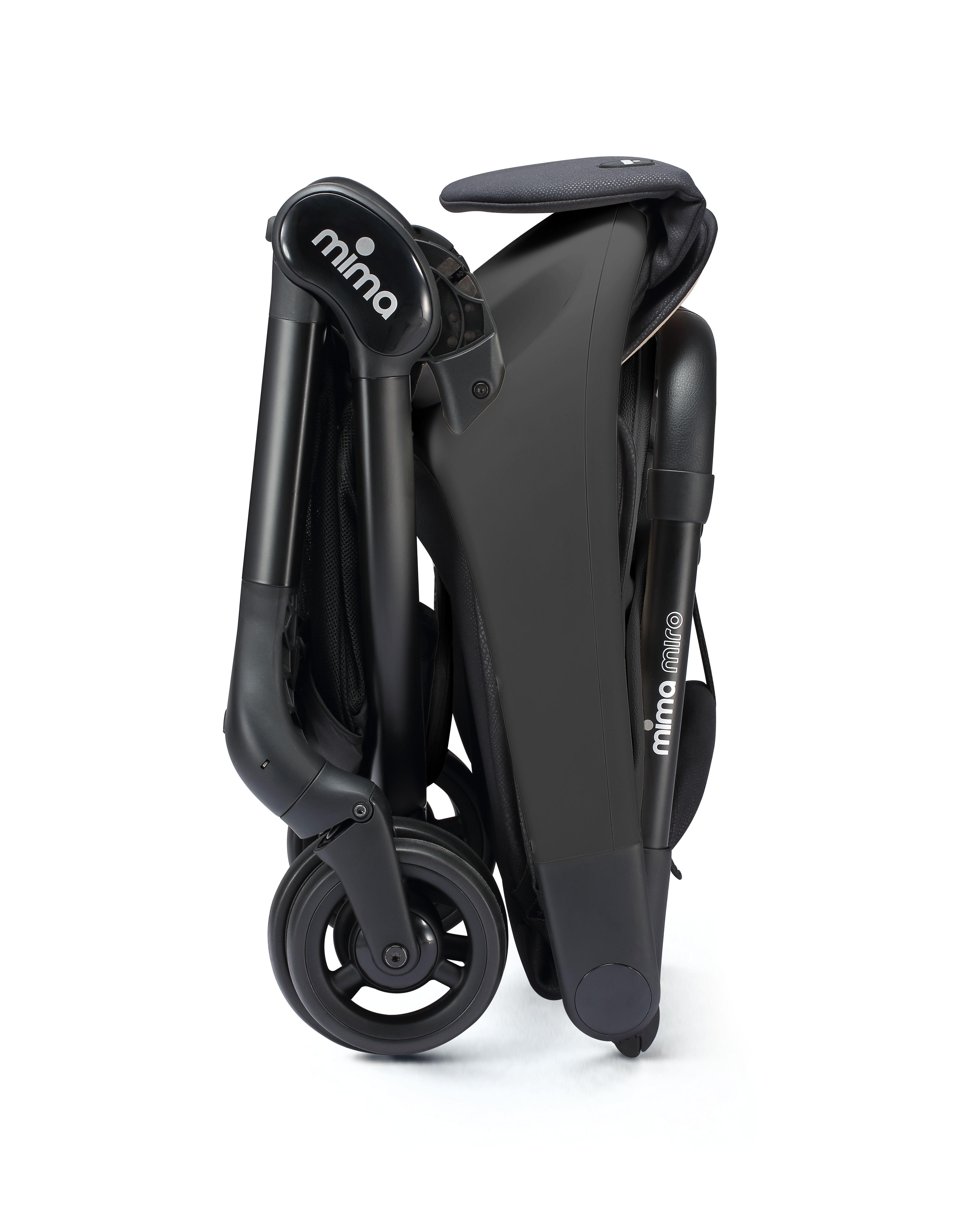 miro compact stroller in black, vertically folded with shadow, side view