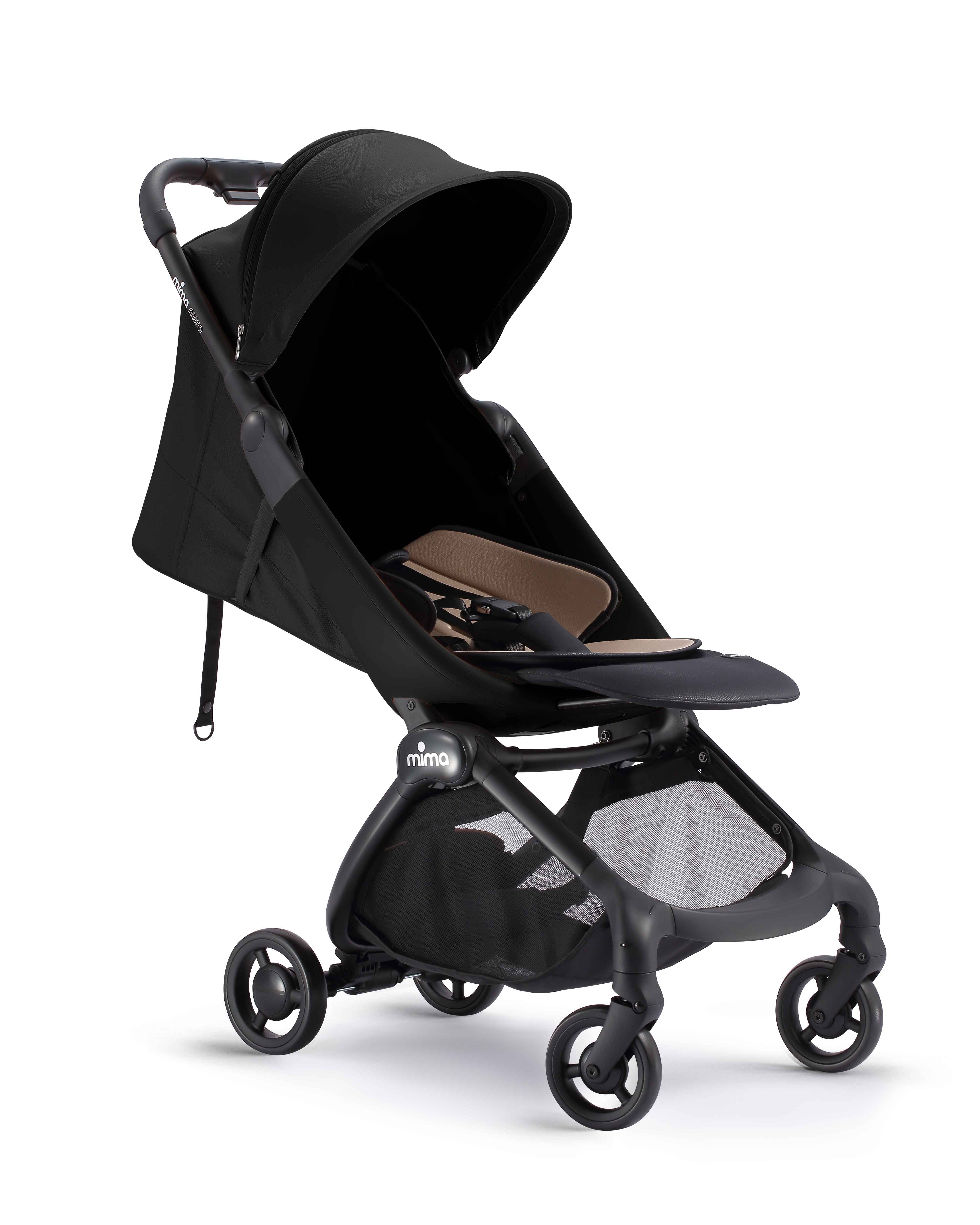 mima miro compact travel stroller in black with light seat and shadow, angled view