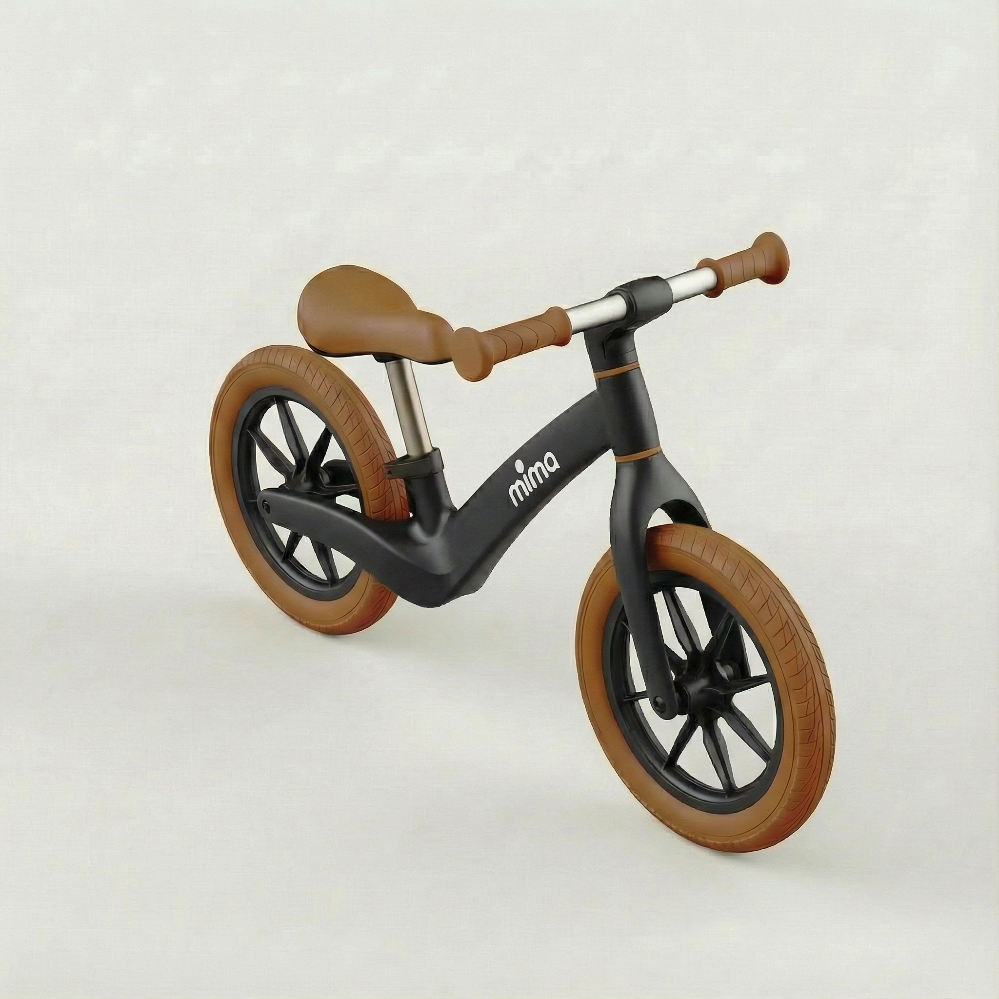 top angled view of mima zoom lite balance bike in black