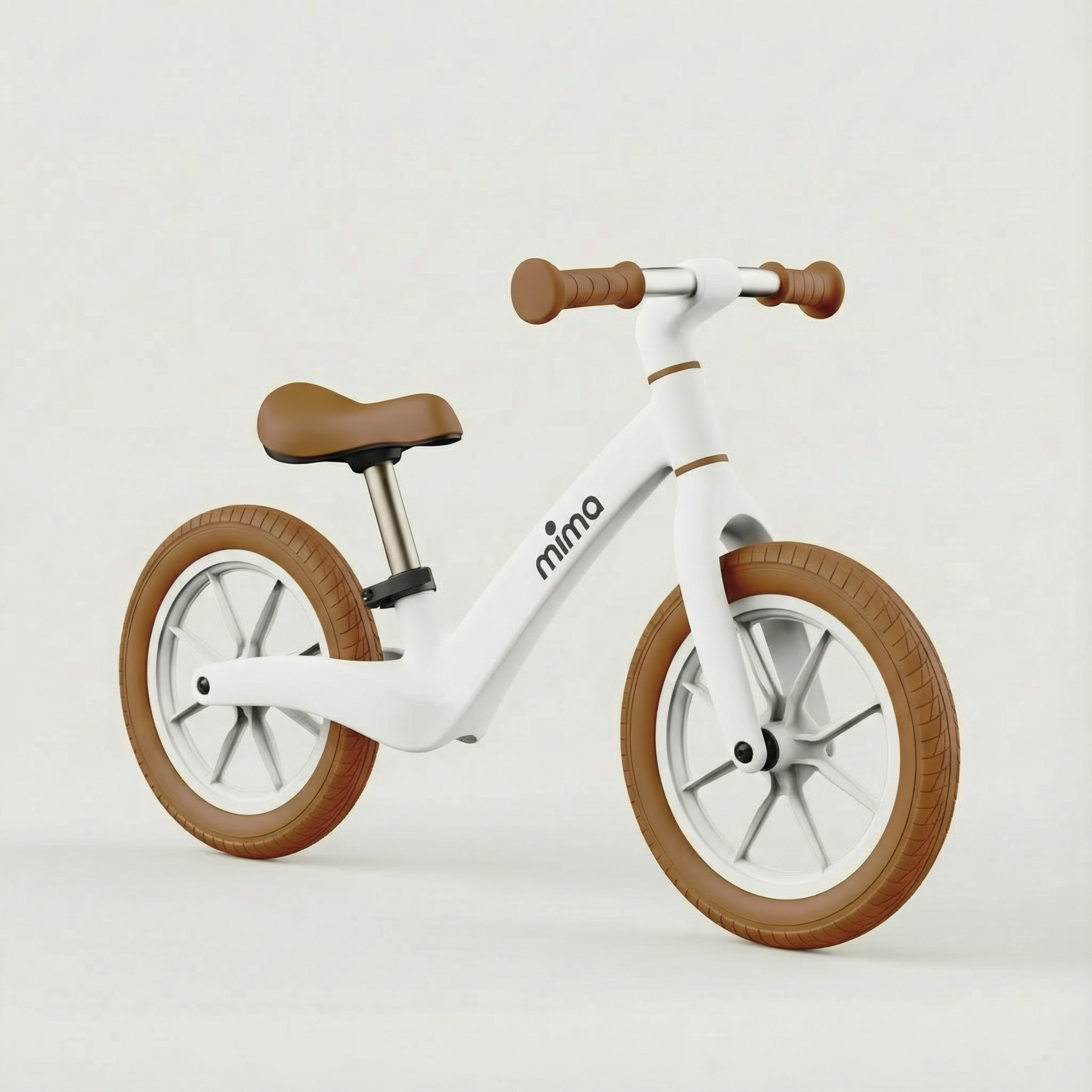 Angled view of mima zoom lite balance bike in white