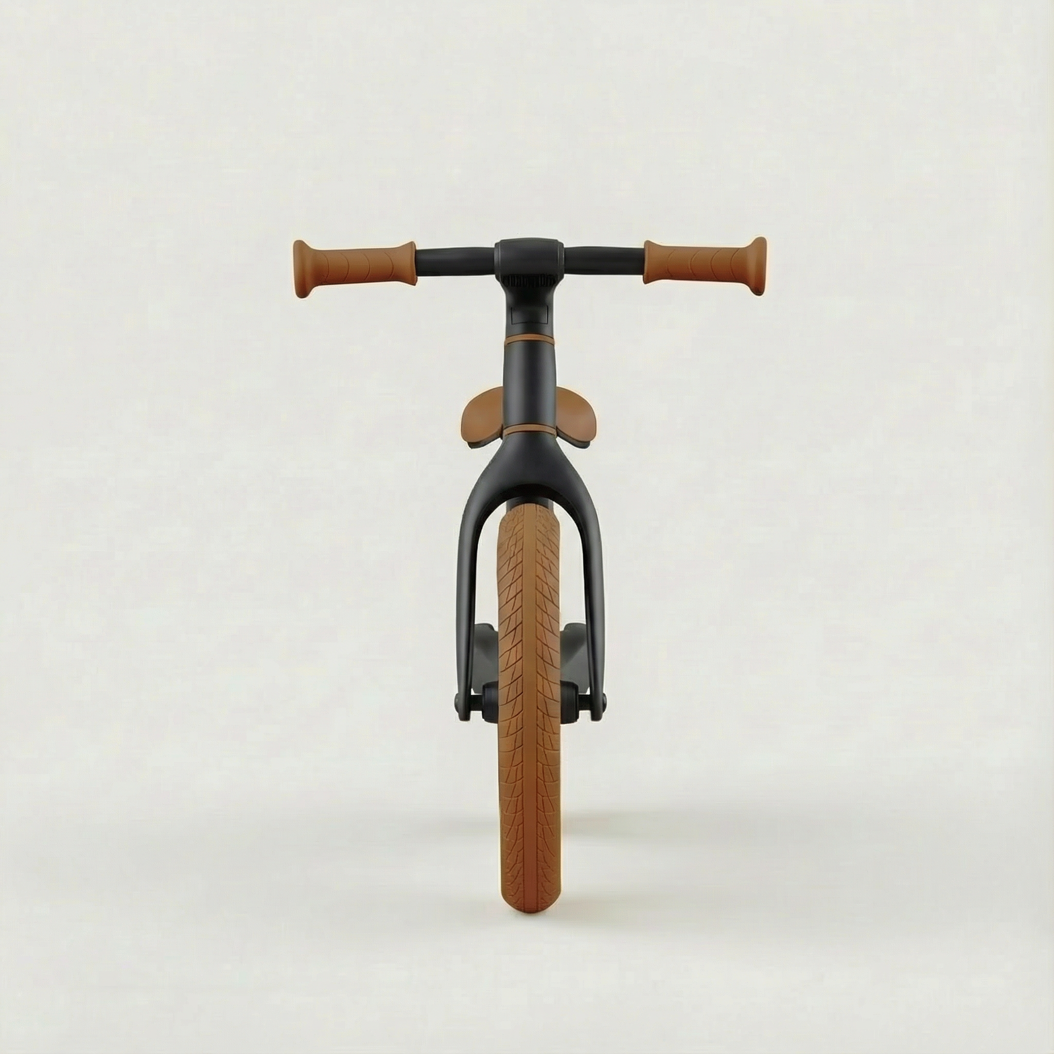 Children's black balance bike front view