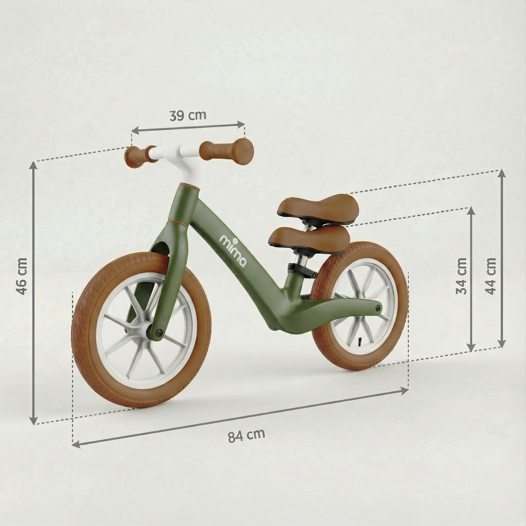 Green balance bike showing dimensions.