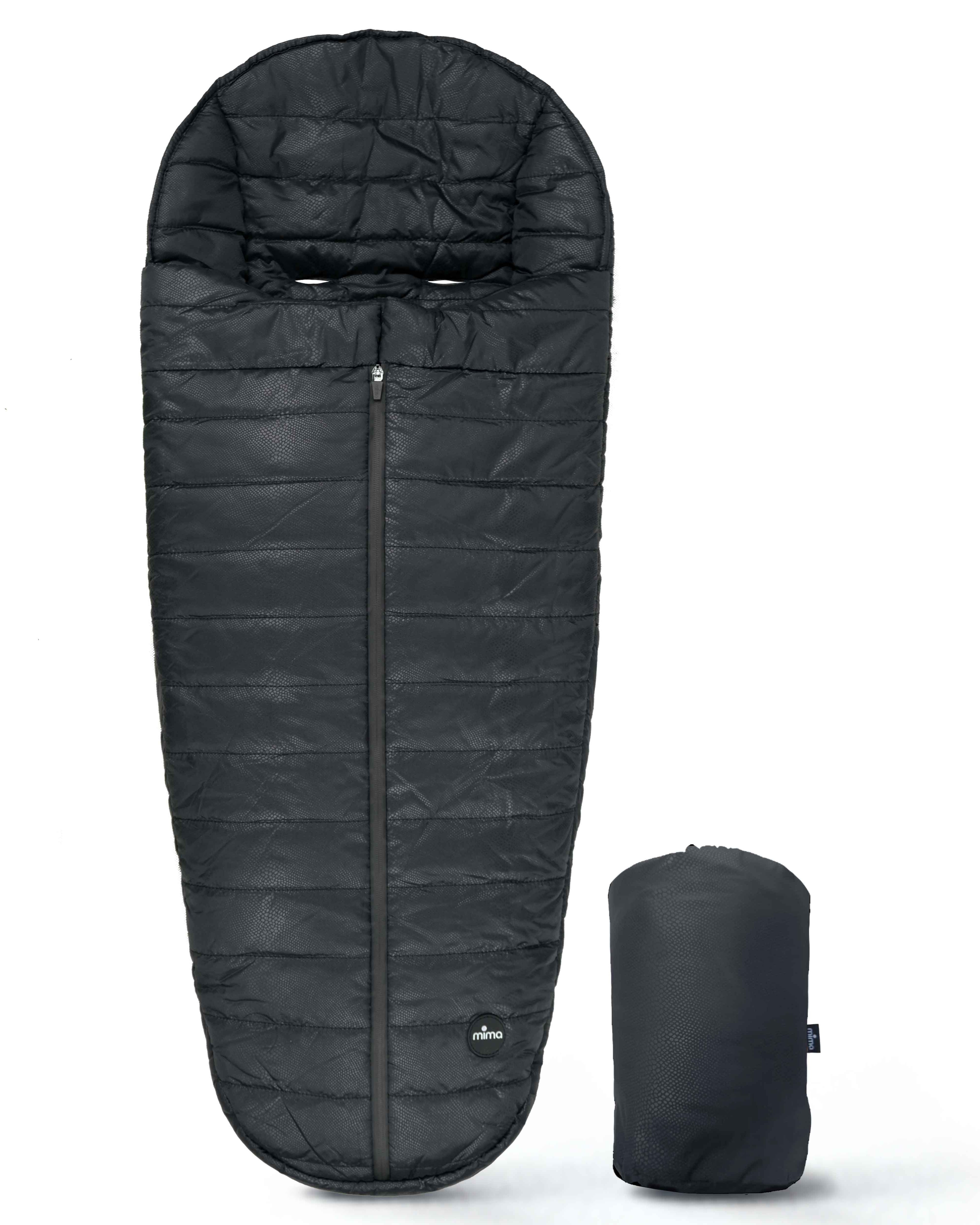 mima compact fold footmuff in black colour with bag on the side. 