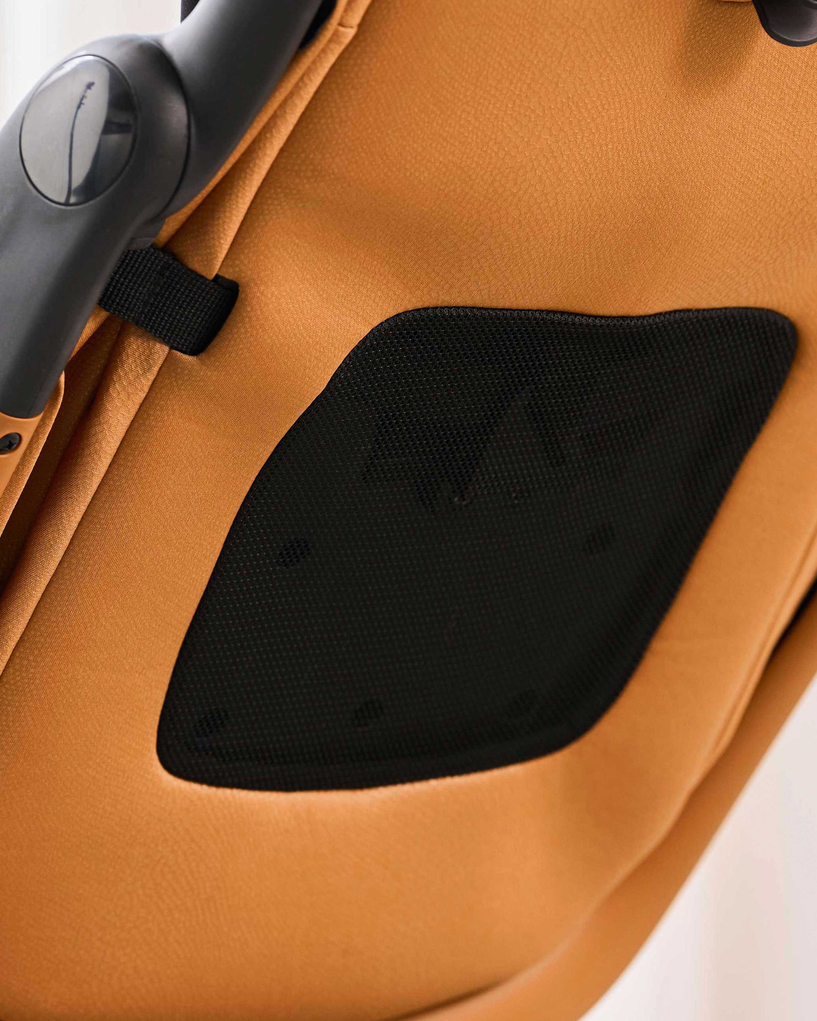 close up of backrest mesh ventilation on miro compact stroller in mocha