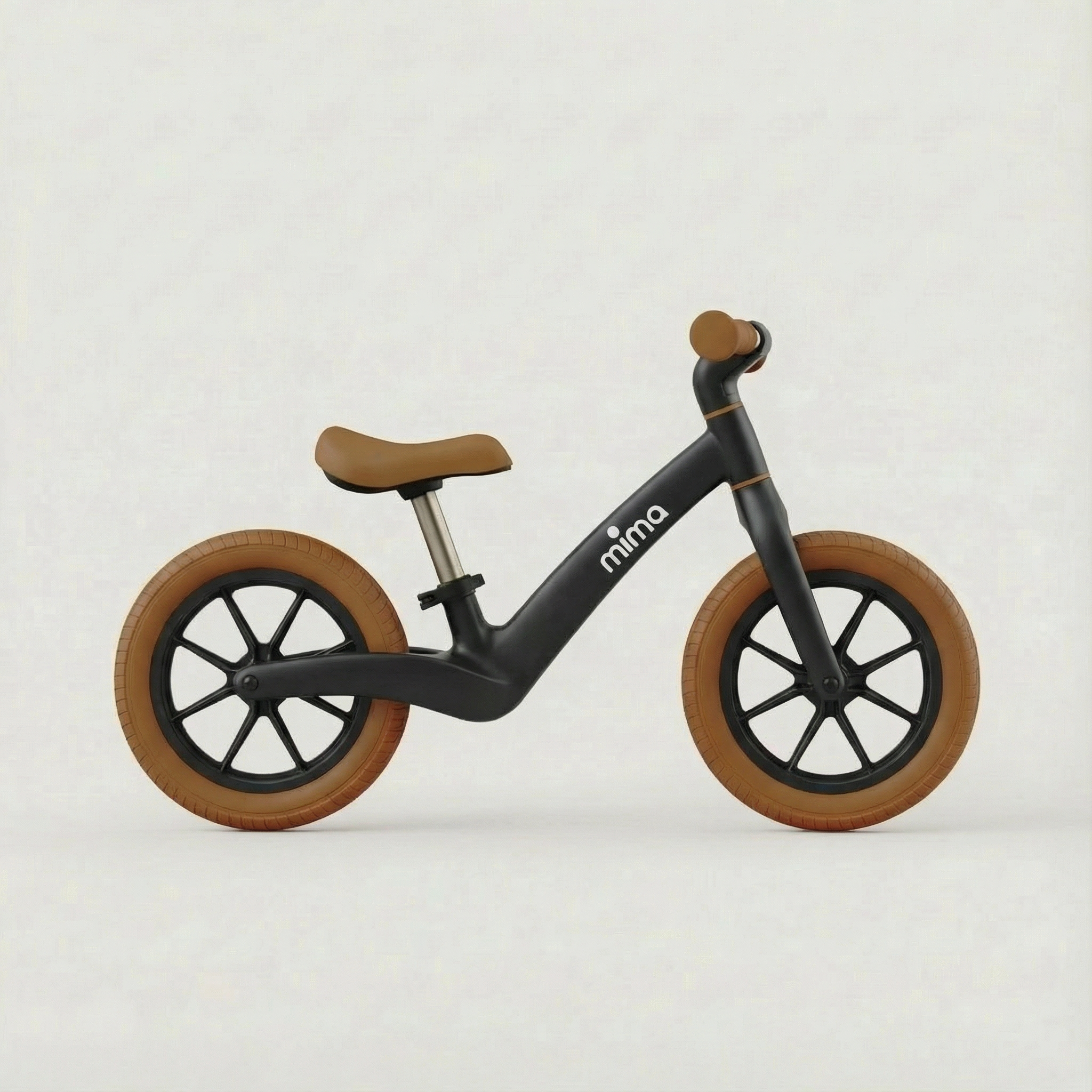 mima zoom lite balance bike in black, side view